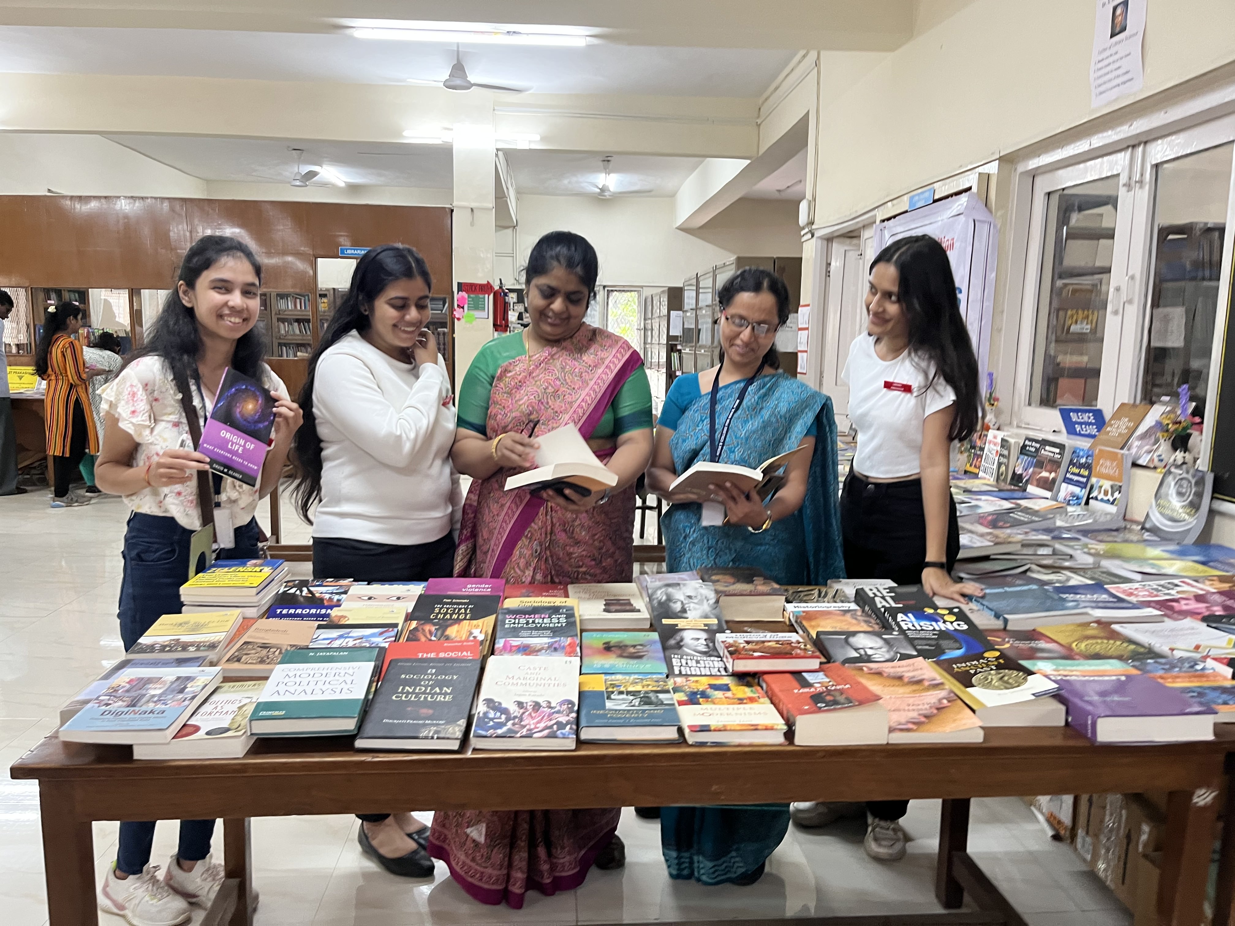 4Teachers perusing the books at the Exhibition-1  